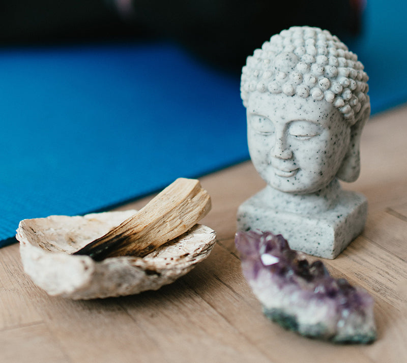 buddha with crystals