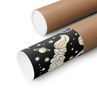 Two brown kraft paper mailers with a black outer sleeve printed with a cream-colored space theme, including a crescent moon, planets, and stars, shown on a white background.