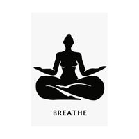 A minimalist black graphic print featuring a silhouette of a woman in a lotus meditation pose with the word 'BREATHE' printed below in a clean sans-serif font, set against a light gray rectangular field on a white background.