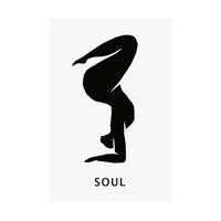 A minimalist black graphic of a person in a yoga or handstand pose on a white rectangular card, with the word 'SOUL' printed below in black sans-serif text.