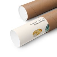 Two brown kraft paper cylindrical gift tubes on a white background, one showing printed text reading 'BIRDSHONE en Jade & Citrine' with crystal illustrations.