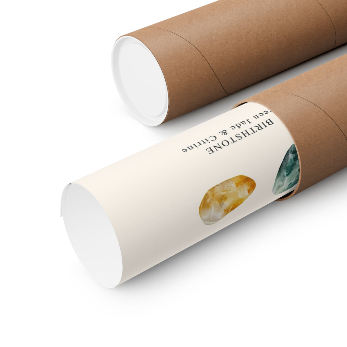 Two brown kraft paper cylindrical gift tubes on a white background, one showing printed text reading 'BIRDSHONE en Jade & Citrine' with crystal illustrations.