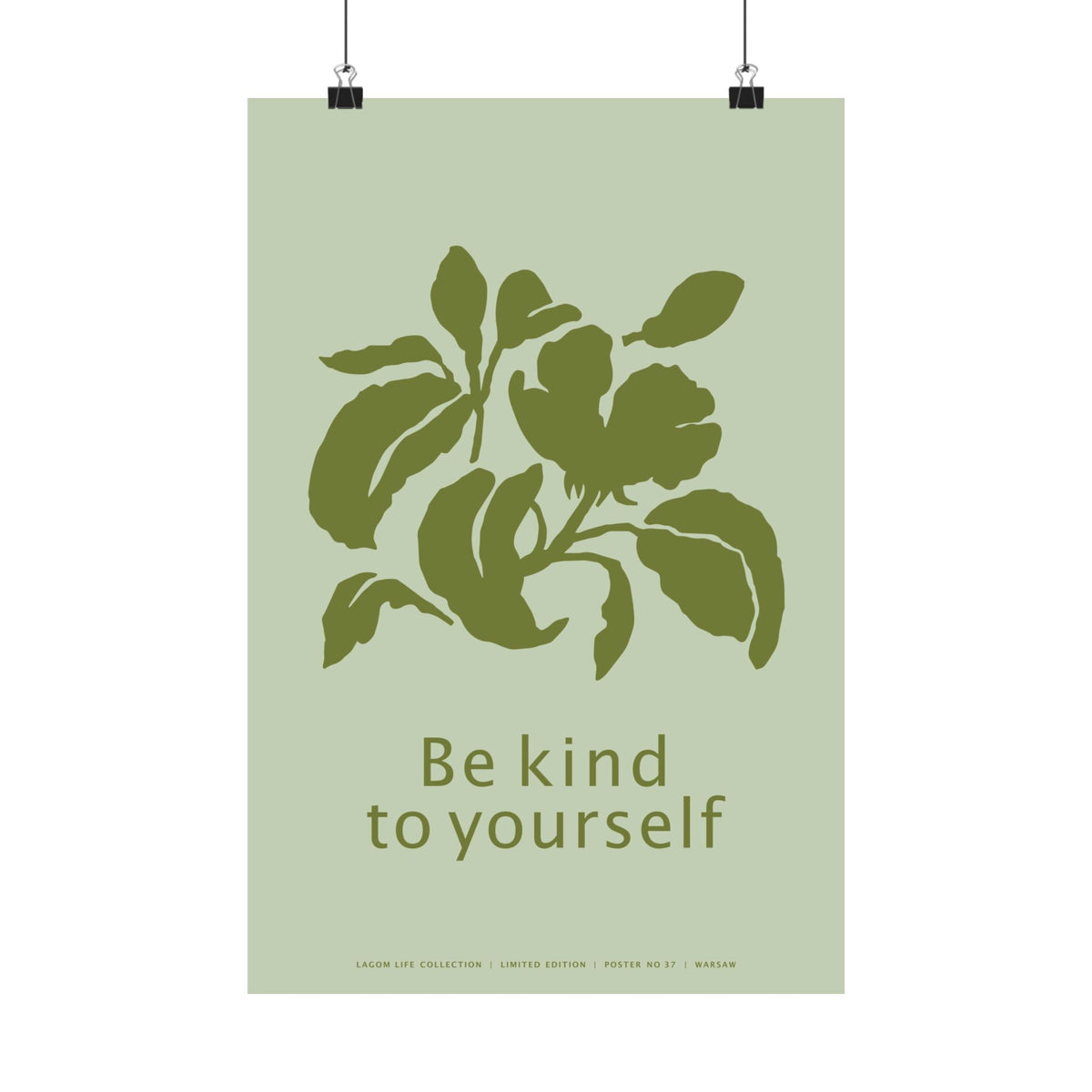 Minimalist botanical art print with olive-green leaves and the words “Be kind to yourself” on a pale green background, 