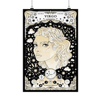 A vertical black-and-cream astrology poster featuring a stylized Virgo woman's profile surrounded by stars, clouds, and celestial motifs, hanging against a white background with two clips.