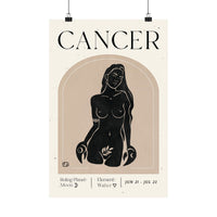A vertical poster print with the word 'CANCER' at the top, featuring a stylized black illustration of a seated nude female figure inside a beige arched frame on an off-white background. Smaller text at the bottom reads 'Ruling Planet Moon', 'Element Water', and 'JUN 21 - JUL 23'.