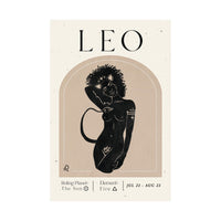 A square art print or poster featuring a stylized black illustration of a woman with wild hair inside a beige arched frame on an off-white background. The word 'LEO' appears at the top, with additional text at the bottom including 'Ruling Planet: The Sun', 'Element: Fire', and dates 'JUL 23 - AUG 23'.