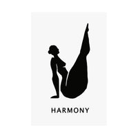 A minimalist black and white art print featuring a silhouette of a woman in a yoga pose with the word 'HARMONY' underneath, shown hanging from two black clips against a white background.