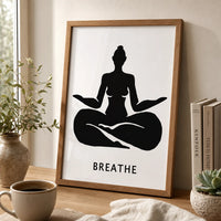 A minimalist black graphic print featuring a silhouette of a woman