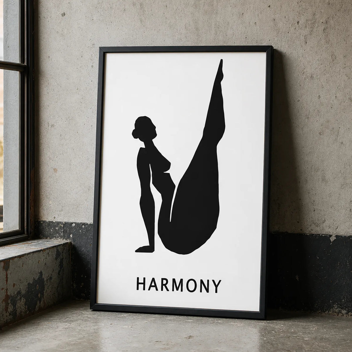 A minimalist black and white art print featuring a silhouette of a woman in a yoga pose with the word 'HARMONY' black frame
