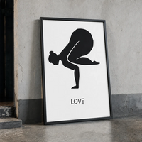 yoga pose print in black frame