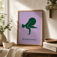 Framed mindfulness yoga art print featuring a deep-green yoga silhouette and the word “Mindfulness” on a lavender background.w brown frame