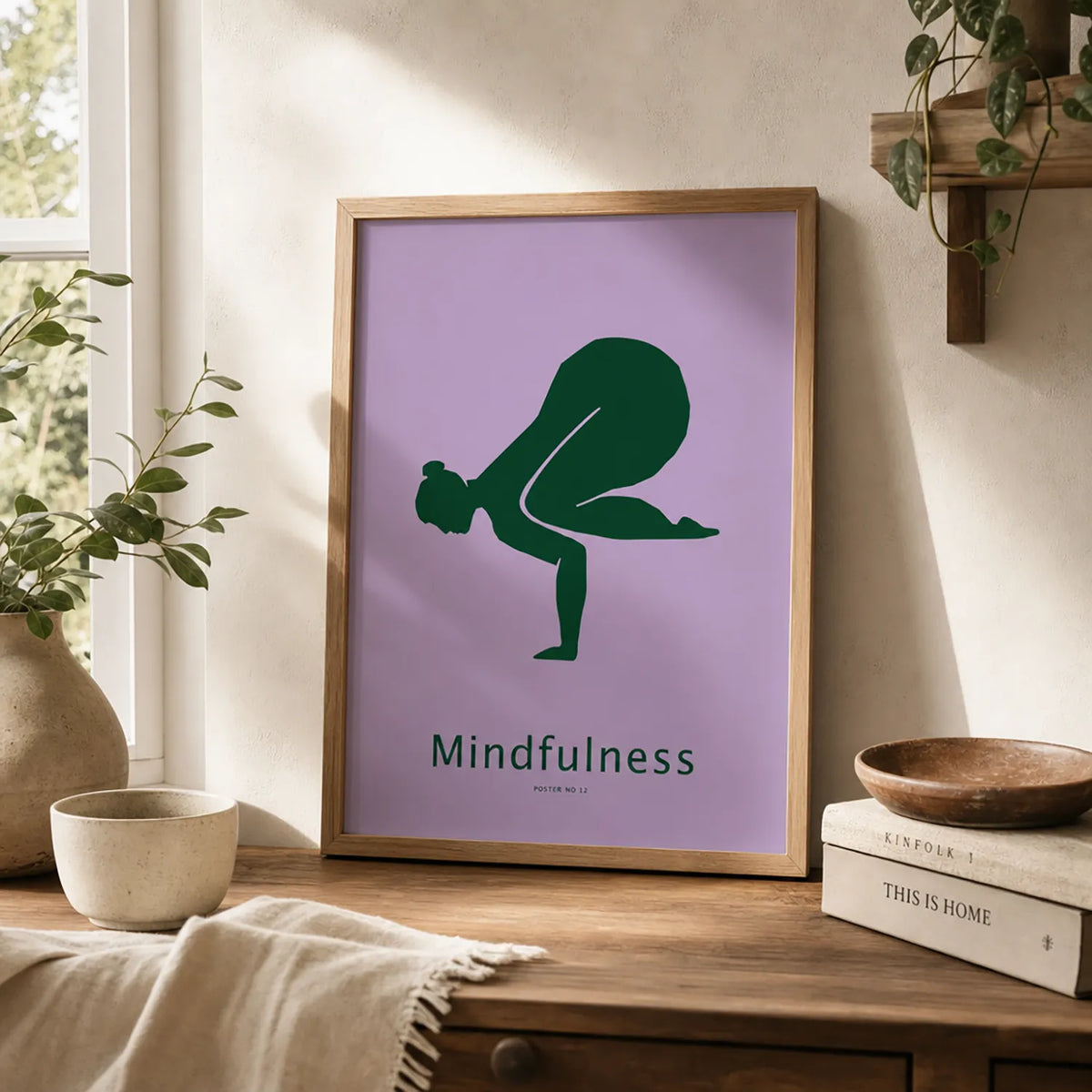 Framed mindfulness yoga art print featuring a deep-green yoga silhouette and the word “Mindfulness” on a lavender background.w brown frame