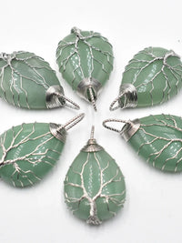 Green aventurine teardrop pendants wrapped in silver wire tree of life design, spiritual jewelry