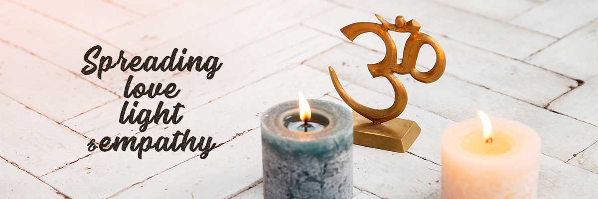 the spiritual planet love light and empathy, with candles and om sign