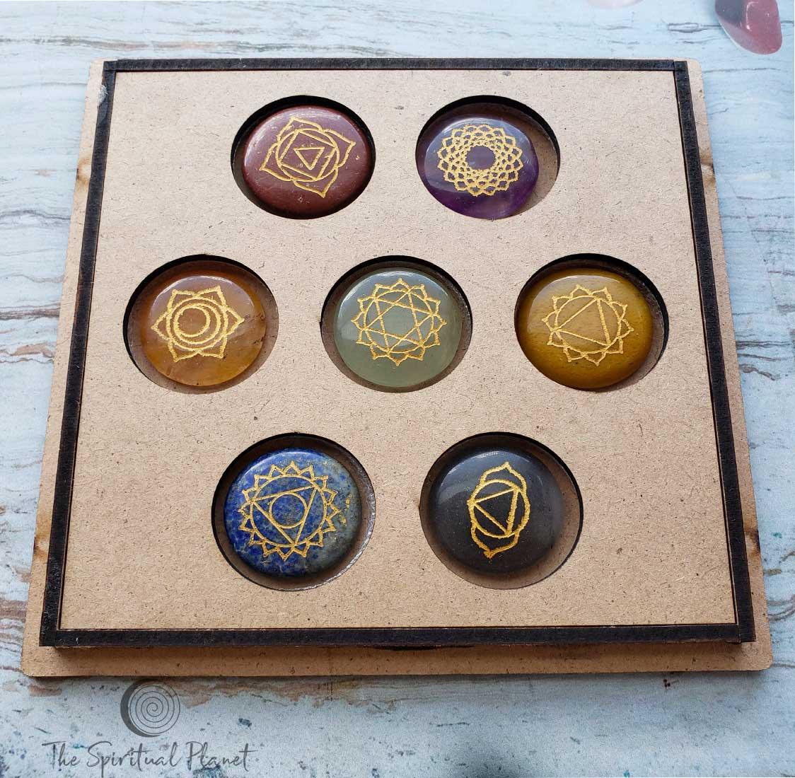 Flower of Life 7 Chakra Set Crown: Amethyst Third Eye: Lolite  Throat: Lapis Lazuli     Heart: Green Aventurine Solar Plexus: Citrine Sacral: Orange Calcite  Root: Red Jasper Align your Chakras