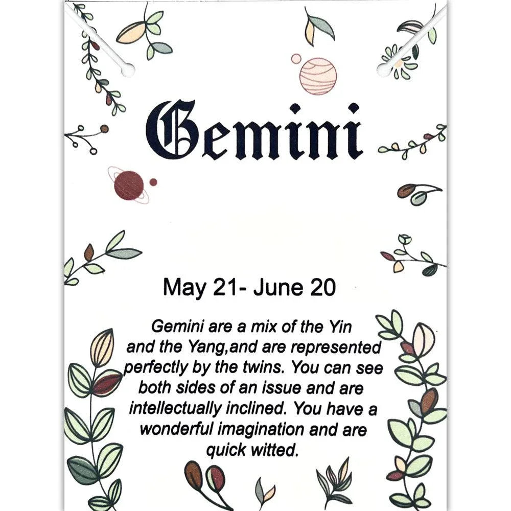 Gemini zodiac sign information card with decorative leaves and planets, May 21-June 20 dates.