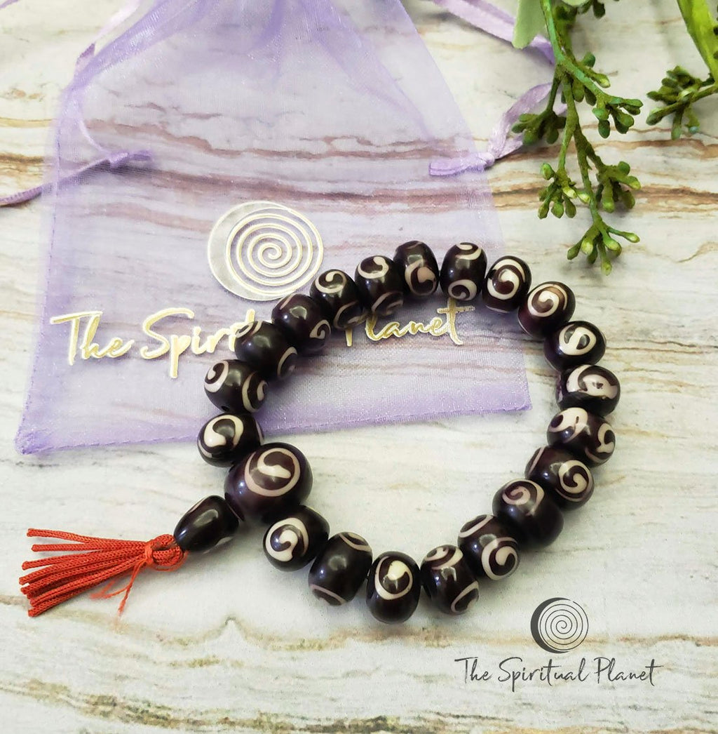 Tibetan Spiral Bead Bracelet With Red Tassel